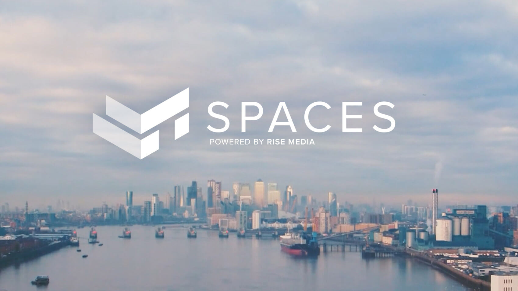 London skyline with a white Spaces logo - a property video production sister company of Rise Media