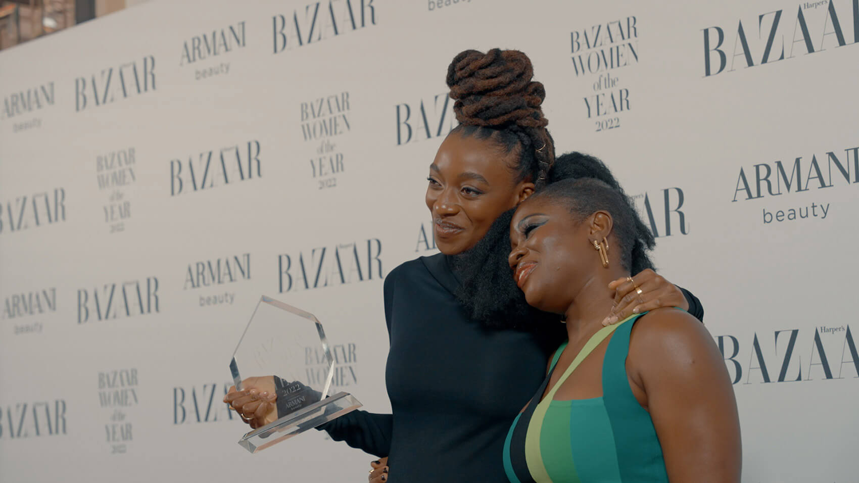 Musician Little Simz and presenter Clara Amfo on stage at the Women of the Year 2022, an event videos project for Harper's Bazaar