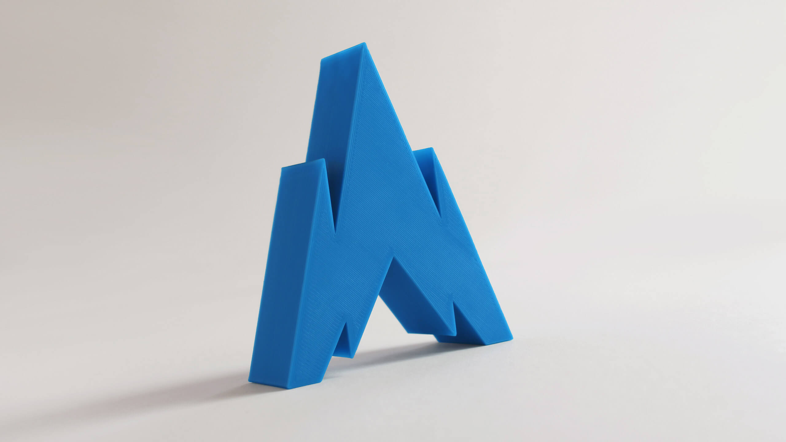 A Rise Media news thumbnail featuring a 3D print of our new logo, for the January 2021 Brand Update article