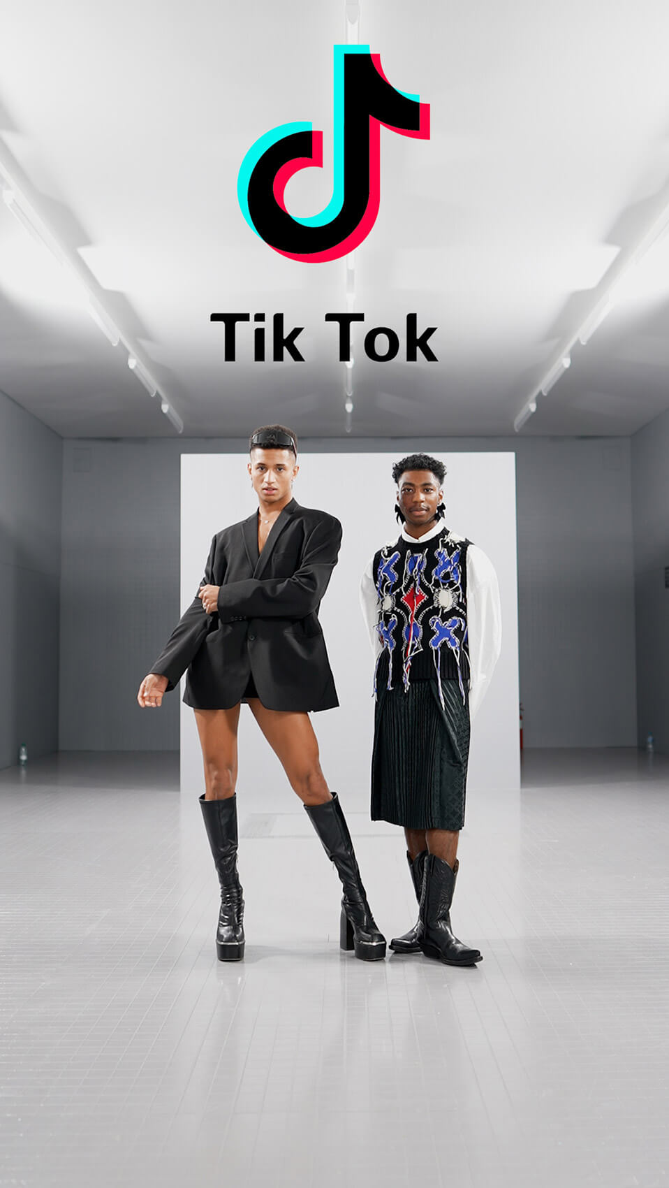 Two models pose in a TikTok London Fashion Week live streaming shot