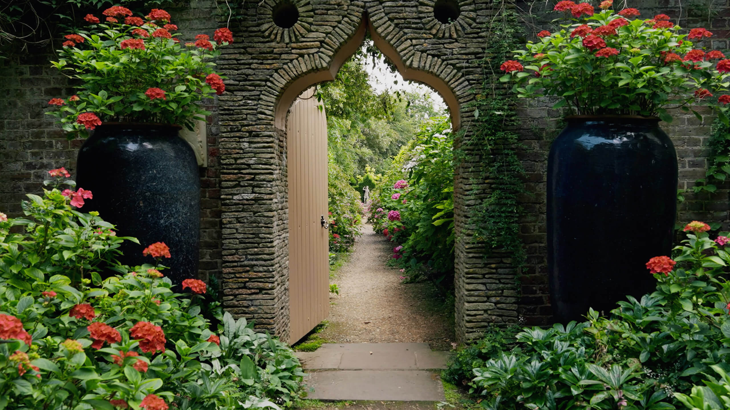 Still image of a garden entrance from a Chanel film by Rise Media.