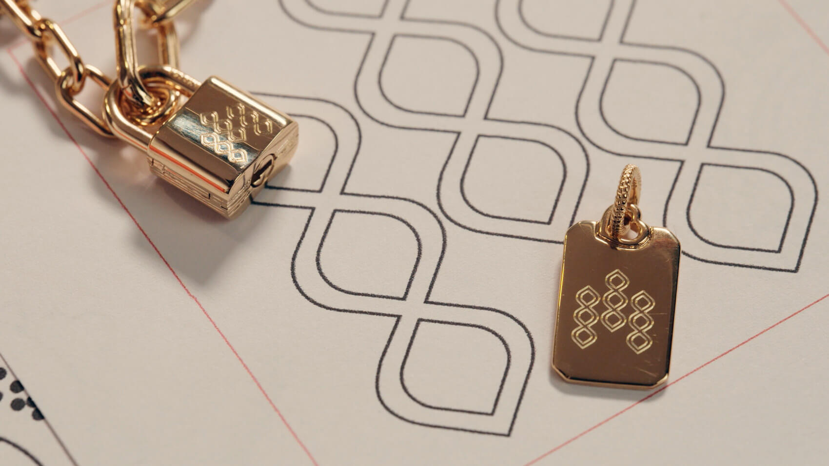 A close up of the design on several necklaces