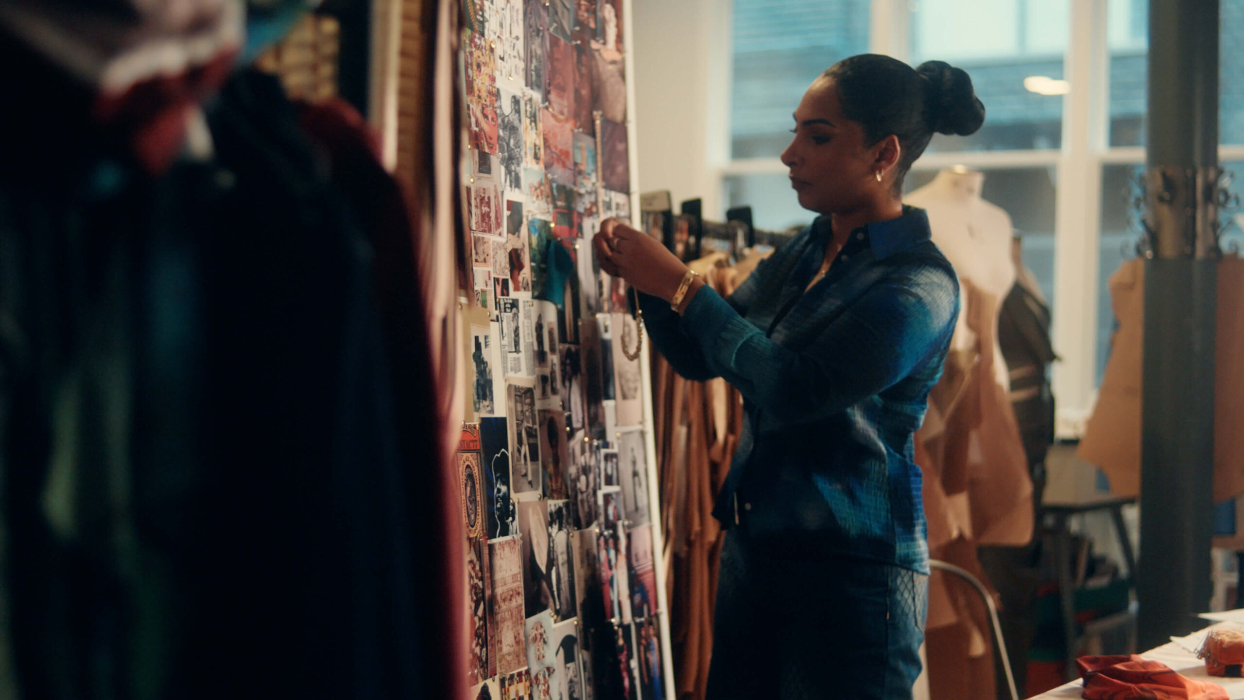 Designer Priya Ahluwalia working on moodboard
