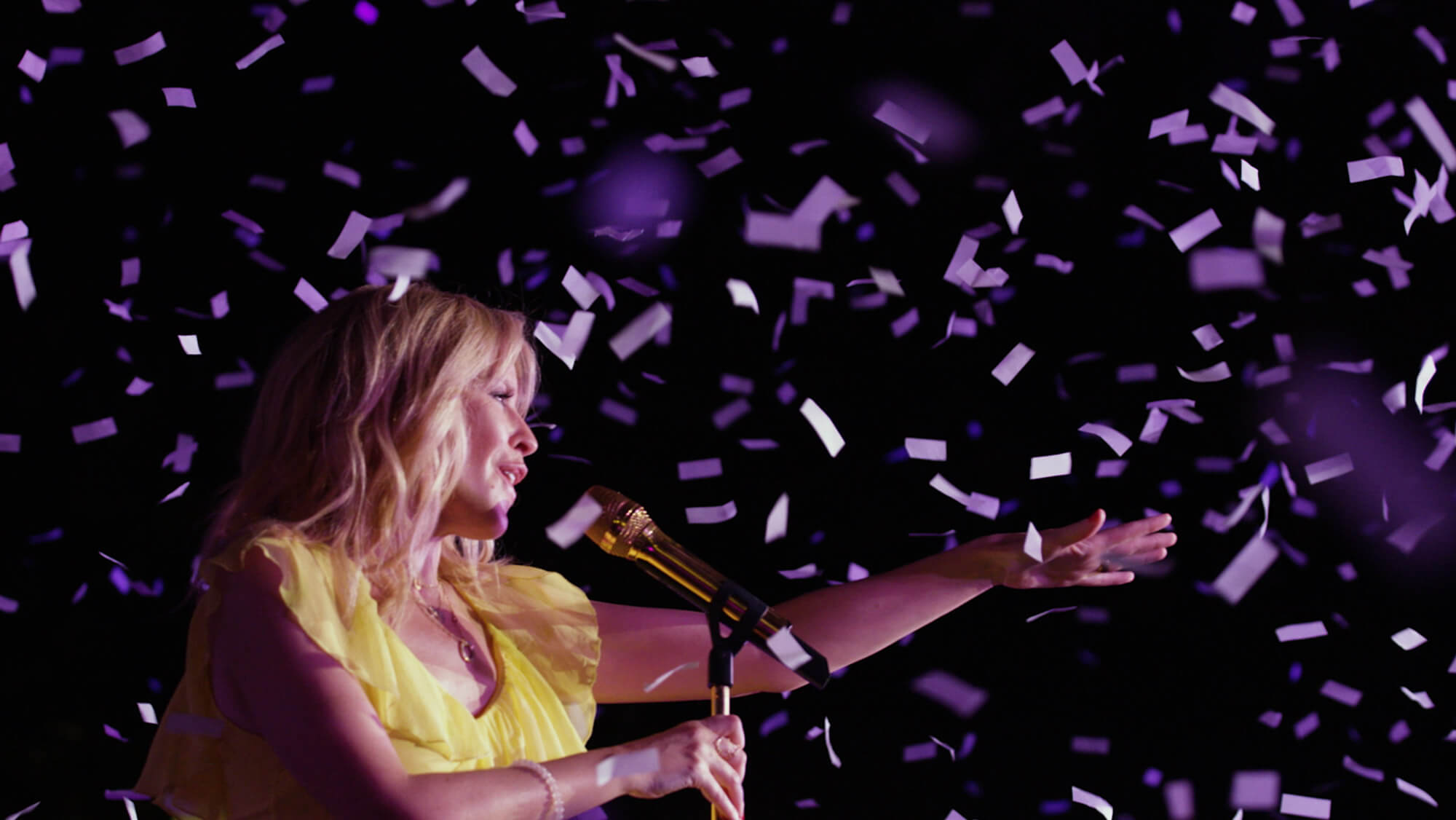 Kylie Minogue singing at night surrounded by confetti at the News UK Cannes Château, from the Rise Media case studies archive